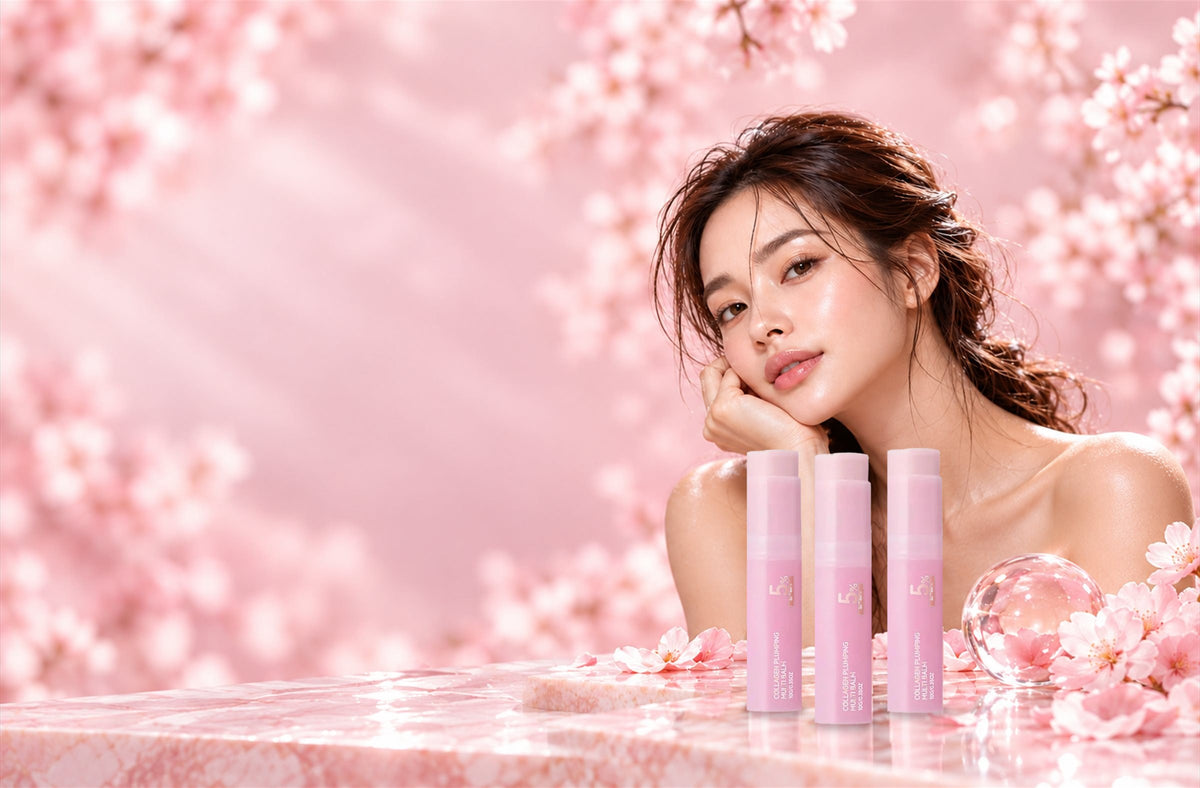 Woman with dewy, glowing skin resting her chin on her hand beside three pink Ellumie PDRN Collagen Multi Balm sticks